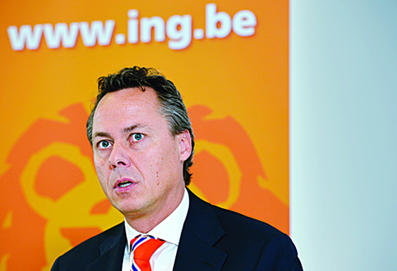 (FILES) In this file photo taken on September 14, 2012 the chief executive officer of Dutch banking giant ING, Ralph Hamers, gives a press conference in Brussels to present results of the first half of 2012. - A Dutch court ordered on December 9, 2020 the prosecution of the head of Swiss banking giant UBS, Ralph Hamers, over money-laundering when he was CEO of the Dutch lender ING. (Photo by DIRK WAEM / BELGA / AFP)