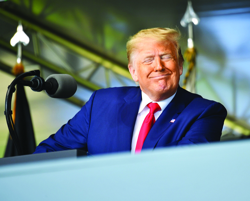 (FILES) In this file photo US President Donald Trump delivers the commencement address at the 2020 US Military Academy Graduation Ceremony at West Point, New York, on June 13, 2020. - US President Donald Trump has issued a number of pardons during his time in the White House and is expected to deliver more before he leaves on January 20, 2021.Trump has also reportedly asked lawyers about the possibility of issuing a pardon for himself for any crimes he might be charged with related to his time in office. (Photo by Nicholas Kamm / AFP)