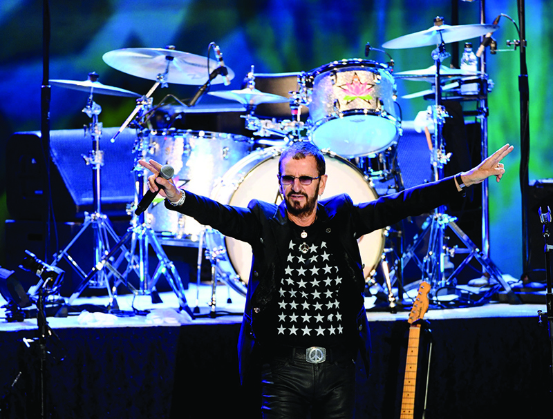 (FILES) In this file photo taken on September 1, 2019 Ringo Starr performs during the Ringo Starr and his All Starr Band concert at The Greek Theatre in Los Angeles, California. - Aged 80, the former Beatles still tours with his All Starr Band, AFP reports on December 5, 2020. (Photo by KEVIN WINTER / GETTY IMAGES NORTH AMERICA / AFP)