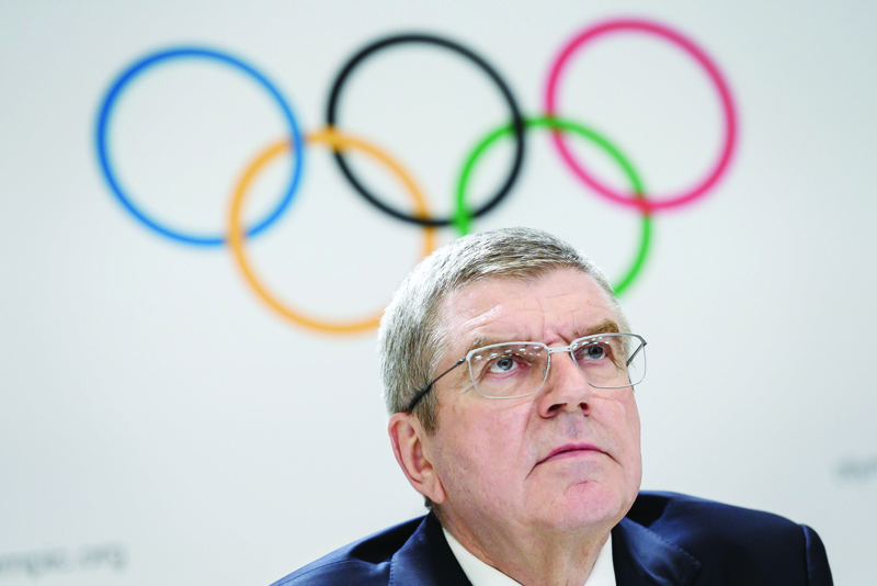 (FILES) In this file photo taken on January 10, 2020, the International Olympic Committee (IOC) President Thomas Bach attends a press conference in Lausanne. - Bach will stand unopposed to serve a second term as International Olympic Committee president, he body said on December 1, 2020 (Photo by Fabrice COFFRINI / AFP)