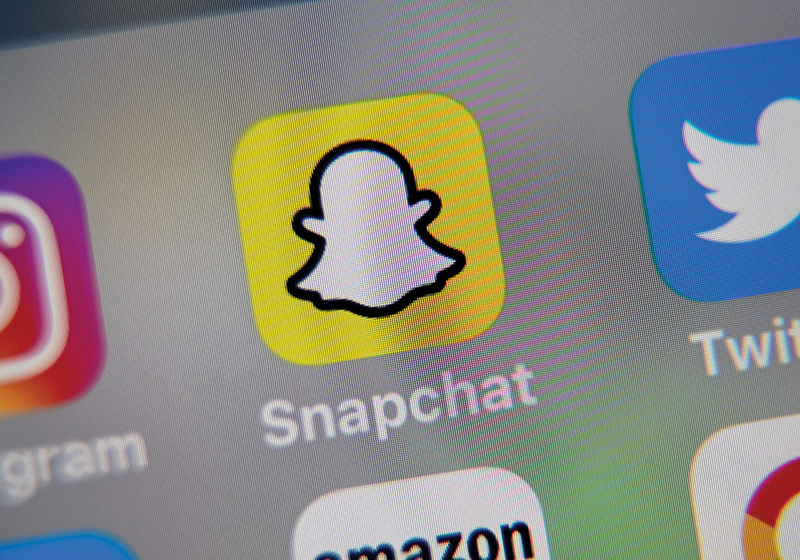 LILLE, France: This file photo shows the logo of mobile app Snapchat displayed on a tablet. - AFP 