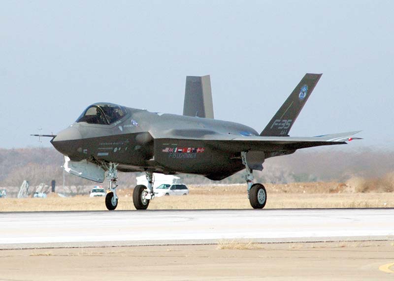 FORT WORTH, Texas: In this file US Navy handout image, an F-35 Joint Strike Fighter Lightning II, built by Lockheed Martin takes off for its first flight to test the aircraft's initial capability from the Joint Reserve Base, Fort Worth, Texas. US President Joe Biden's administration has temporarily frozen for review a massive package of F-35 jets to the United Arab Emirates and arms to Saudi Arabia, officials said on Wednesday.-AFP
