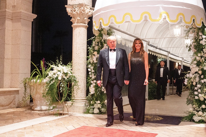 PALM BEACH: In this file photo taken on December 31, 2019 US President Donald Trump and First Lady Melania Trump arrive for a New Year's celebration at Mar-a-Lago in Palm Beach, Florida. President Donald Trump will leave Washington in disgrace next week, destined for a warmer welcome in Florida, where some supporters are so gung-ho they recently wrote his name on the back of a fat, lumbering manatee. - AFPn