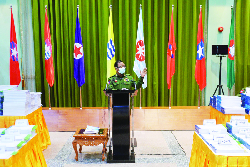 NAYPYIDAW, Myanmar: Myanmar's military spokeperson Brigadier-General Zaw Min Tun speaks during a press briefing at the Defense Service Museum in Naypyidaw yesterday.-AFP n