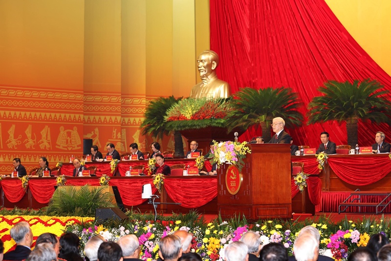 HANOI: This handout photo taken yesterday shows Vietnam's President and Communist Party general secretary Nguyen Phu Trong addressing the opening session of the Communist Party of Vietnam (CPV) 13th National Congress at the National Convention Centre in Hanoi.-AFP n