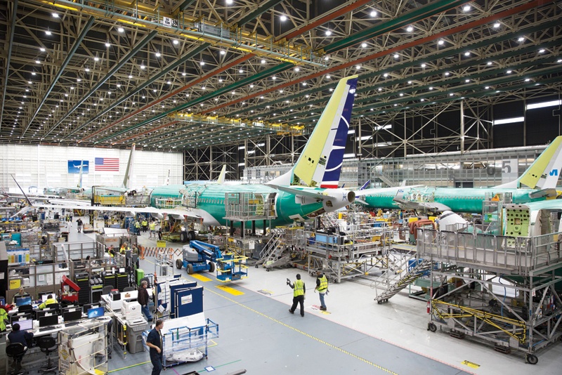 RENTON: In this file photograph, employees work on Boeing 737 MAX aircraft at the Boeing Renton Factory in Renton, Washington State. The European Union Aviation Safety Agency (EASA) plans to authorize the Boeing 737 MAX to fly again next week.-AFPn
