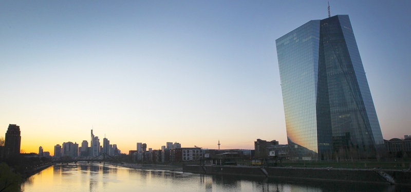 FRANKFURT: This file photo taken on March 24, 2020 shows the sun setting behind the headquarters of the European Central Bank (ECB) and the city skyline. - AFP 