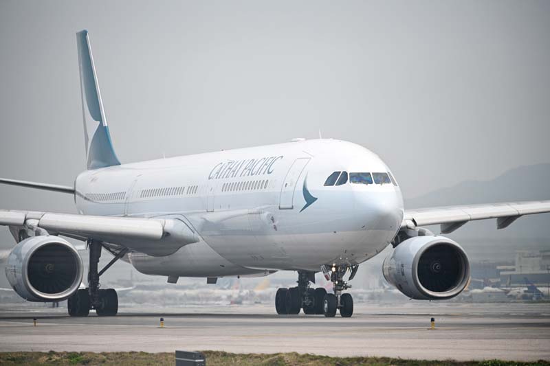 A Cathay Pacific passenger plane preparing to take off from Hong Kong's international airport. - AFPn