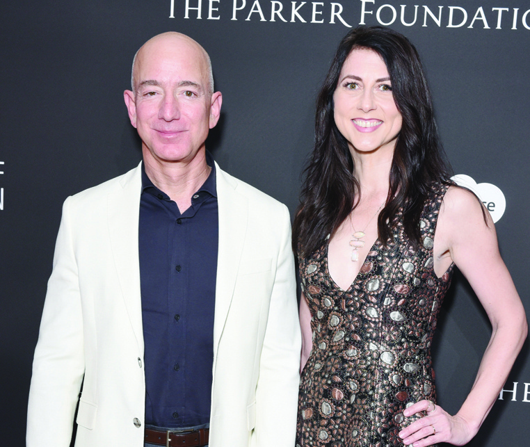 In this file photo, CEO of Amazon Jeff Bezos (left) and MacKenzie Bezos attend the 7th Annual Sean Penn & Friends HAITI RISING Gala benefiting J/P Haitian Relief Organization in Hollywood, California. - AFPn