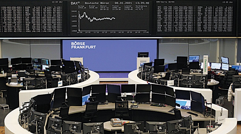 FRANKFURT: A display showing the German Stock Market Index DAX is pictured at the stock exchange in Frankfurt, Germany. - AFPn