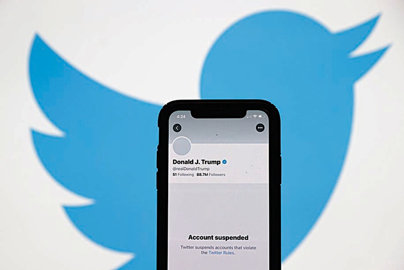 SAN ANSELMO, California:The suspended Twitter account of US President Donald Trump appears on an iPhone screen in San Anselmo, California. - AFPn