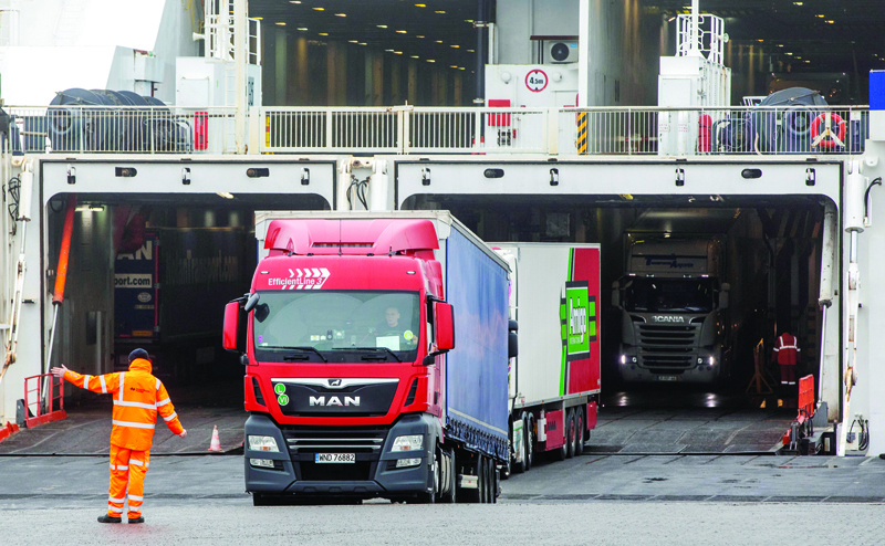 Freight lorries and HGVs disembark from the Stena Line ferry 'Kerry', after arriving at the port of Rosslare Harbor in Rosslare, southeast Ireland. - AFPn