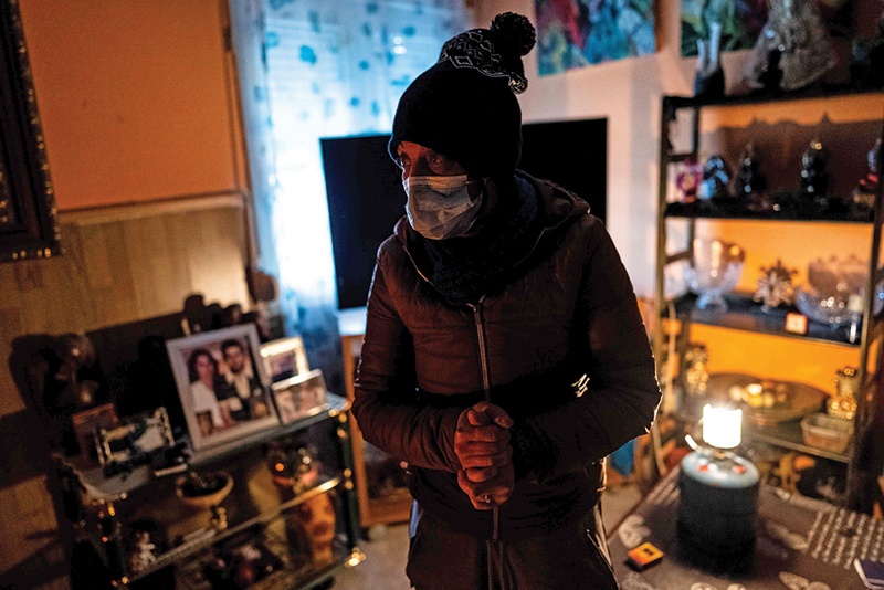 LA CANADA REAL, Spain: Yolanda Martin, 47, stands in the living room of her house in sector 6 of this shantytown on the outskirts of Madrid on Jan 12, 2021 following a heavy snowstorm. - AFP n