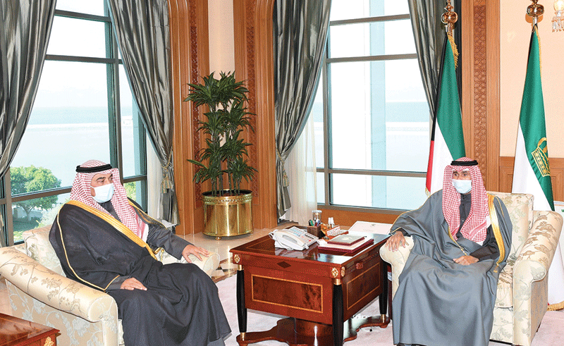 KUWAIT: HH the Amir Sheikh Nawaf Al-Ahmad Al-Jaber Al-Sabah meets HH the Prime Minister Sheikh Sabah Al-Khaled Al-Hamad Al-Sabah at Seif Palace yesterday. - AFP n