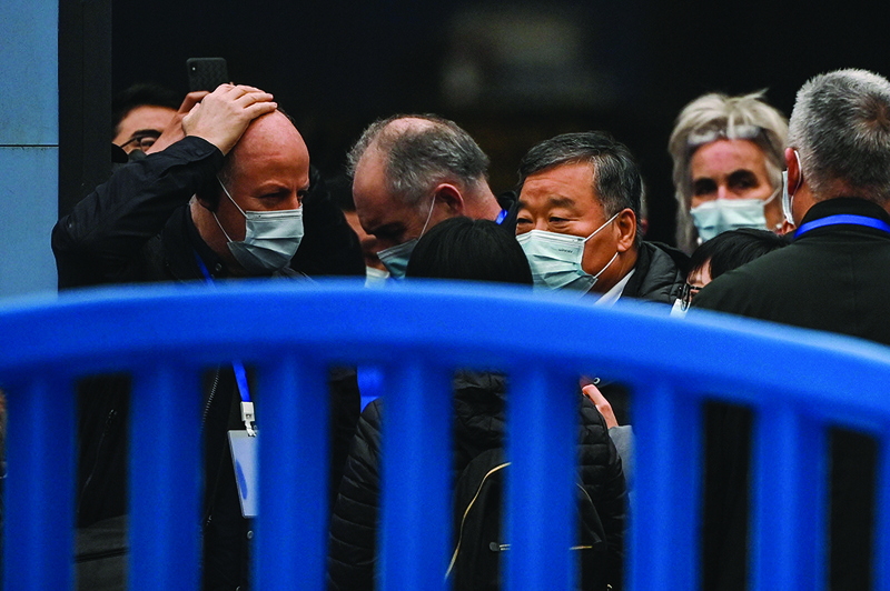 WUHAN, China: Members of a World Health Organization team, investigating the origins of the COVID-19 coronavirus, visit the closed Huanan Seafood wholesale market yesterday. - AFP n