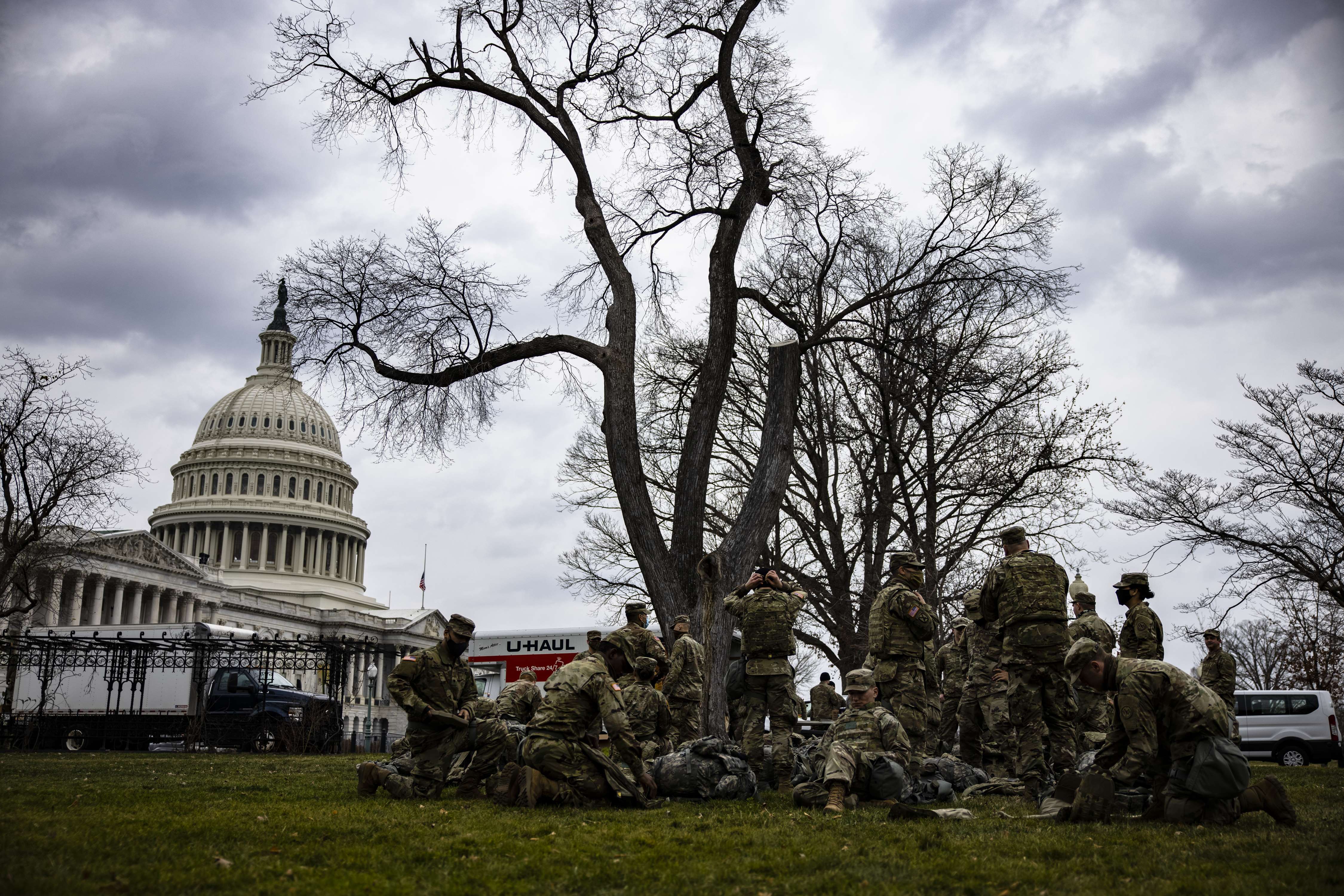WASHINGTON: National Guard troops are seen on the lawn of the US Capitol building on Friday. - AFP n