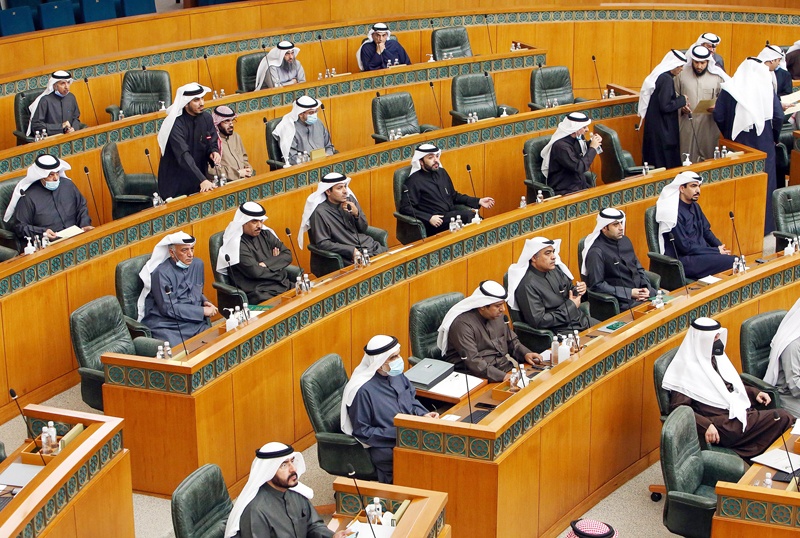 Kuwaiti MPs attend a parliament session at the national assembly in Kuwait City on January 5, 2021. (Photo by YASSER AL-ZAYYAT / AFP)