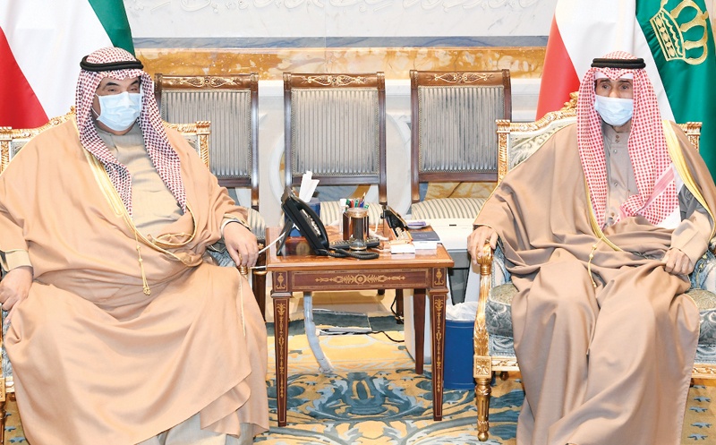 KUWAIT: His Highness the Amir Sheikh Nawaf Al-Ahmad Al-Jaber Al-Sabah meets His Highness Sheikh Nasser Al-Mohammad Al-Ahmad Al-Sabah. - Amiri Diwan and KUNA photosn