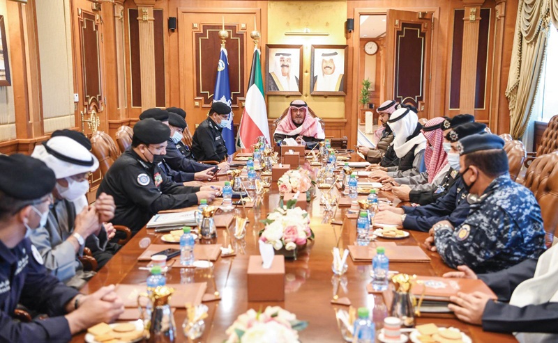KUWAIT: Interior Minister Sheikh Thamer Ali Sabah Al-Salem Al-Sabah chairs a meeting with senior ministry officials on Monday. - Interior Ministry photon