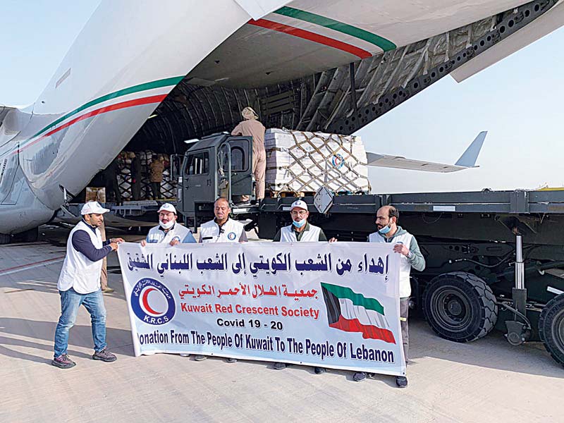 KUWAIT: A relief plane headed to Lebanon is loaded with medical supplies donated by Kuwait Red Crescent Society (KRCS) yesterday. - KUNA  nn