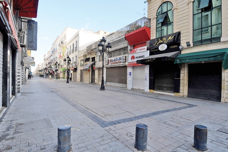 TUNIS: Cafes and shops are shuttered in the capital amid a lockdown due to the COVID-19 pandemic yesterday as the country marks 10 years since its revolution. - AFP n