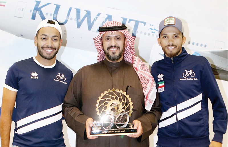 KUWAIT: Kuwait Cycling Club Secretary General Abdullah Al-Shimmari (center) with Kuwaiti cyclists Khalid Al-Khalifa and Abdelhadi Al-Ajmi.n