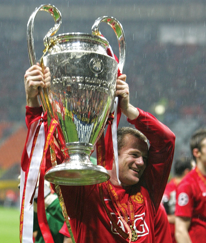 MOSCOW: In this file photo taken on May 21, 2008 Manchester United's Wayne Rooney holds up the trophy after beating Chelsea in the final of the UEFA Champions League football match at the Luzhniki stadium in Moscow. - AFPn