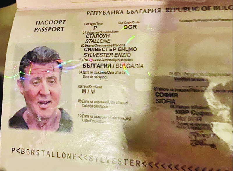 This handout photo shows details of a fake Bulgarian passport in the name of US actor Sylvester Stallone. - AFP n