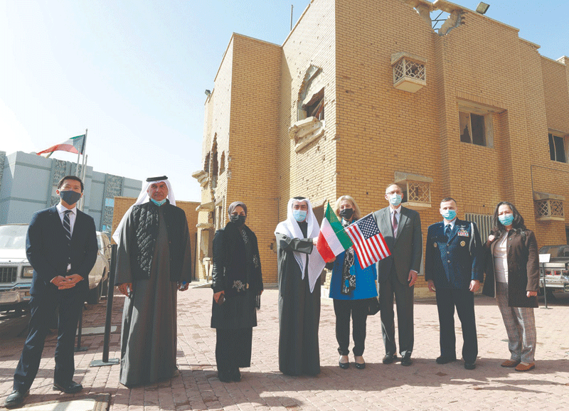 KUWAIT: US Ambassador to Kuwait Alina L Romanowski in a group picture outside Al-Qurain Martyrs Museum.n