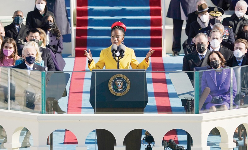 American poet Amanda Gorman reads a poem during the 59th inaugural ceremony on the West Front of the US Capitol in Washington, DC. -AFP photosn