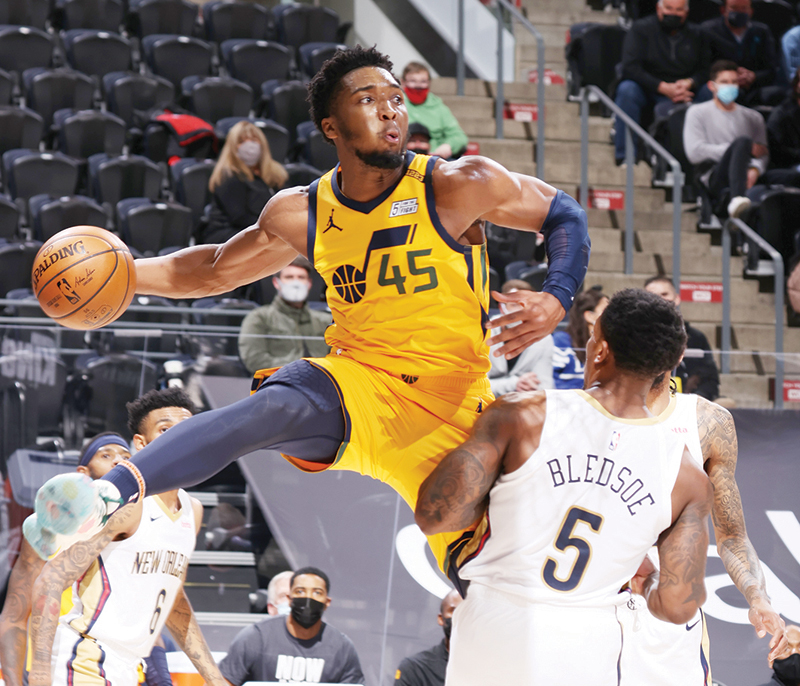 SALT LAKE CITY: Donovan Mitchell #45 of the Utah Jazz passes the ball during the game against the New Orleans Pelicans on Tuesday at vivint.SmartHome Arena in Salt Lake City, Utah. - AFPn