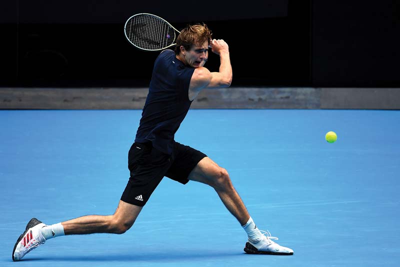 MELBOURNE: Germany's Alexander Zverev hits a return during a practice session in Melbourne yesterday. - AFPn