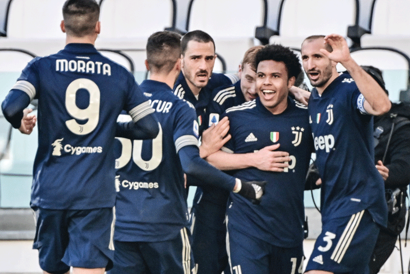 TURIN: Juventus' American midfielder Weston McKennie (second right) celebrates after scoring during the Italian Serie A football match Juventus vs Bologna yesterday at the Juventus stadium in Turin. - AFPn