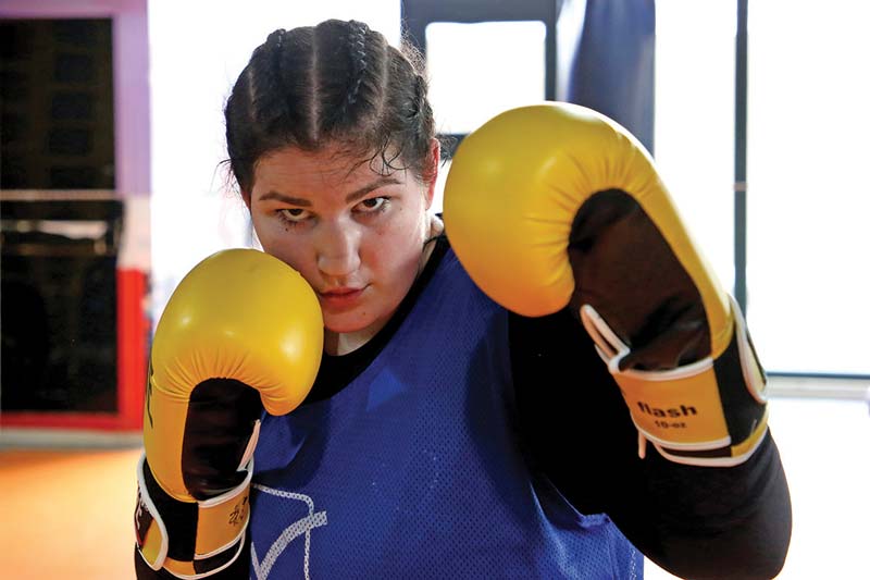 SHKODER: Albanian boxer Elsidita Selaj, 20-year old, poses for a photo during a training session at a gym in the city of Shkoder, on January 21, 2021. - AFPn