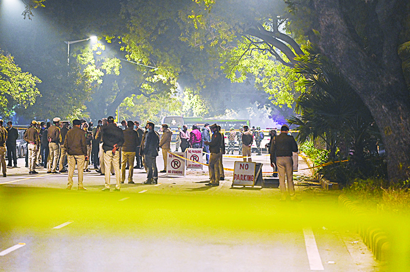 NEW DELHI: Police cordon off an area at a street after an explosion near the Israeli embassy in New Delhi on Friday.-AFPnnn