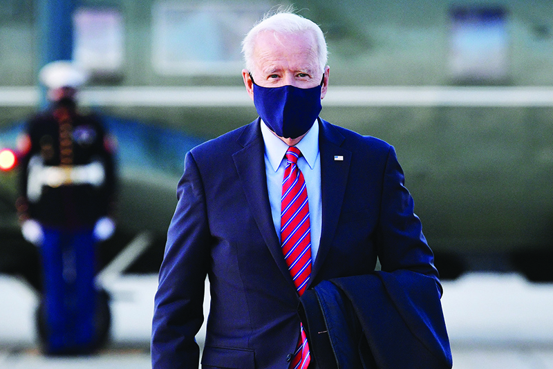 US President Joe Biden makes his way to board Air Force One before departing from Andrews Air Force Base in Maryland. Biden on Friday seized on feeble US employment data to argue the world’s largest economy needs his $1.9 trillion pandemic relief package, which cleared a key Senate hurdle without support from the Republican opposition. —AFP