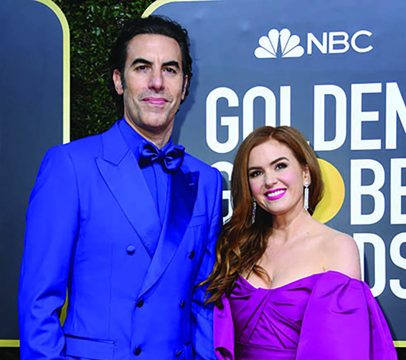 In this file photo actor Sacha Baron Cohen and his wife actress Isla Fisher arrive for the 77th annual Golden Globe Awards at The Beverly Hilton hotel in Beverly Hills, California.