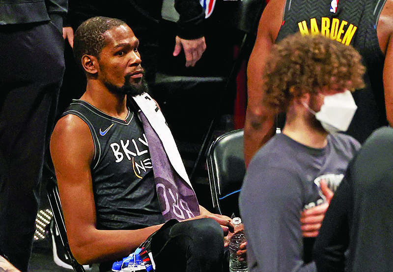 NEW YORK: Kevin Durant #7 of the Brooklyn Nets reacts as he sits during a time out against the Toronto Raptors at Barclays Center on Friday in New York City.   — AFP