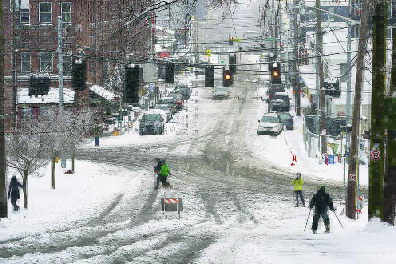 SEATTLE, Washington: A skier makes their way down a hill in Seattle, Washington. -AFP 