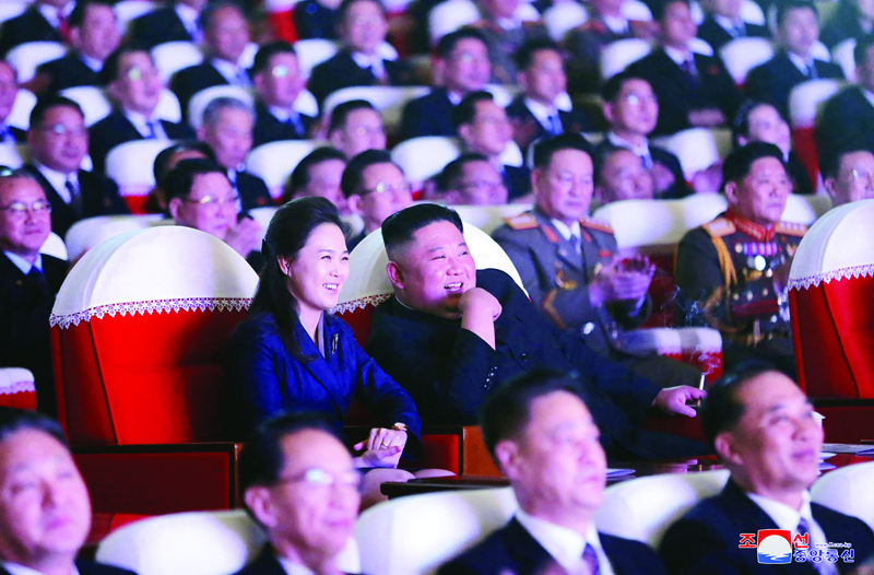 PYONGYANG, North Korea: This picture shows North Korean leader Kim Jong Un (center) and his wife Ri Sol Ju (left) watching a performance for celebrating the birth anniversary of Chairman Kim Jong Il at the Mansudae Art Theatre in Pyongyang.-AFP n
