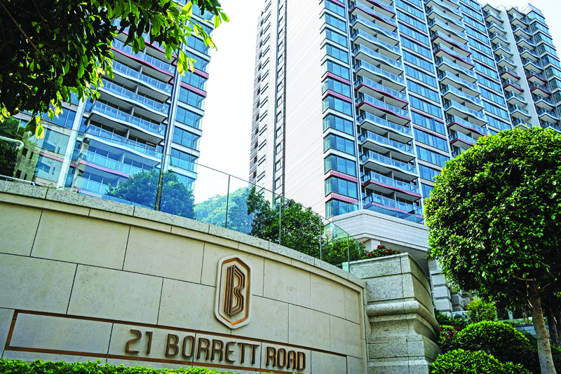HONG KONG: This general view shows residential buildings at 21 Borrett Road in Hong Kong yesterday where a five-bedroom, 3,378 square-foot penthouse flat has sold for $59.3 million. - AFPn