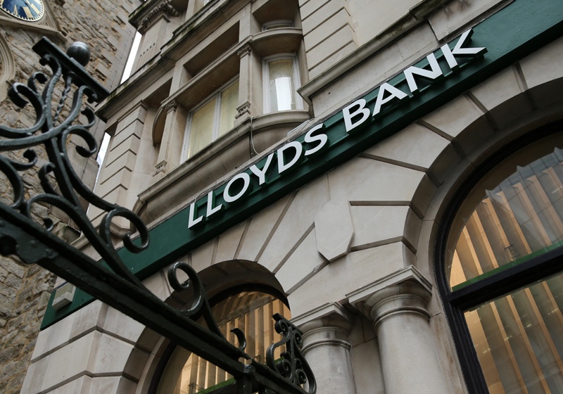 In this file photo, a signage for Lloyds Bank is pictured outside a branch in the City of London. – AFPn