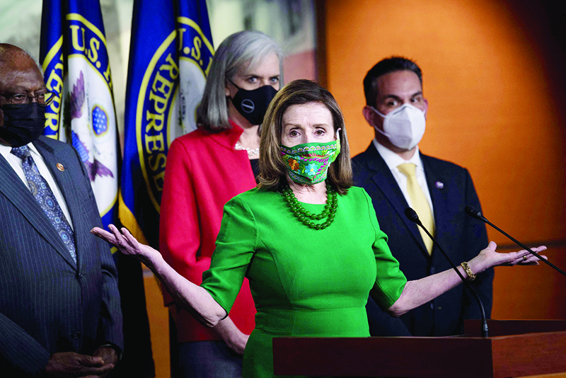 WASHINGTON: Speaker of the House Nancy Pelosi speaks during a press conference with other House Democratic leaders about COVID-19 financial relief and minimum wage on Capitol Hill on Friday. — AFP