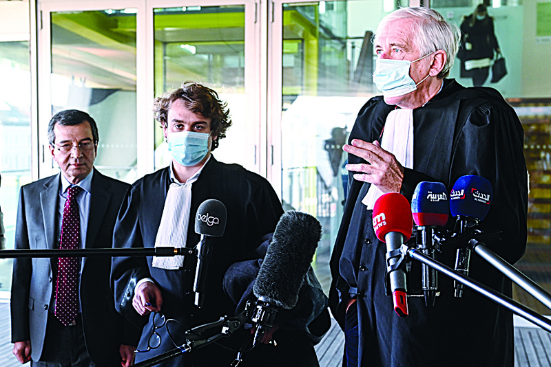 ANTWERP: National Council of Resistance of Iran (NCRI) member Favzin Hashemi (left), Lawyer Rik Van Reusel (center) and Lawyer Georges-Henri Beauthier speak to the press following the trial of four people, including a Belgian couple of Iranian heritage and an Iranian diplomat at the Antwerp criminal court yesterday.-AFPn