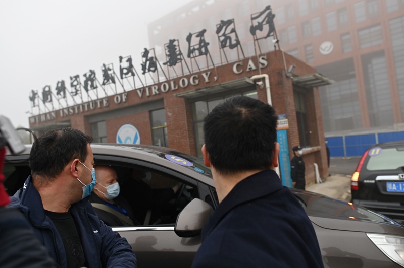 WUHAN: Members of the WHO team investigating the origins of the COVID-19 coronavirus arrive at the Wuhan Institute of Virology yesterday. – AFP n