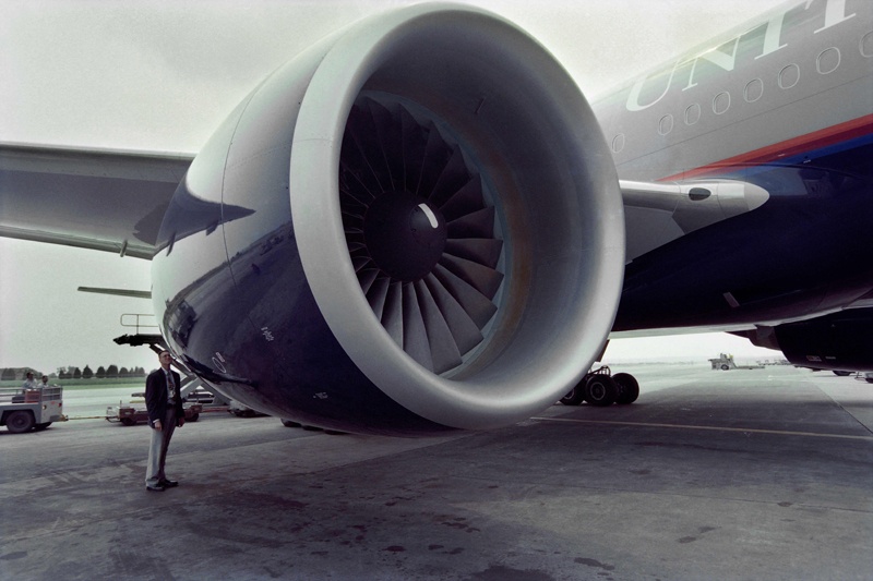HERNDON, Virginia: In this file photo, an inspector for Pritt and Whitney engines checks a United Airlines Boeing 777 after it made its inaugural flight from Heathrow Airport in London to Washington Dulles International Airport on June 7, 1995. - AFP n