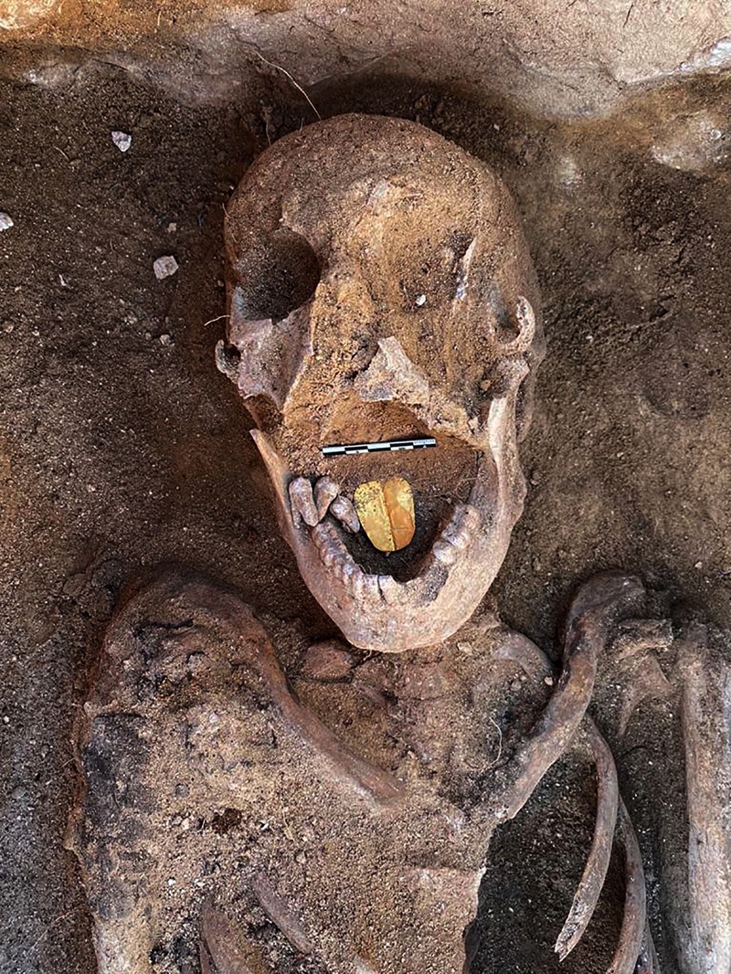 ALEXANDRIA: A handout picture released yesterday shows a 2,000-year-old mummy with a gold foil amulet inside his mouth uncovered at the Taposiris Magna Temple. – AFP n