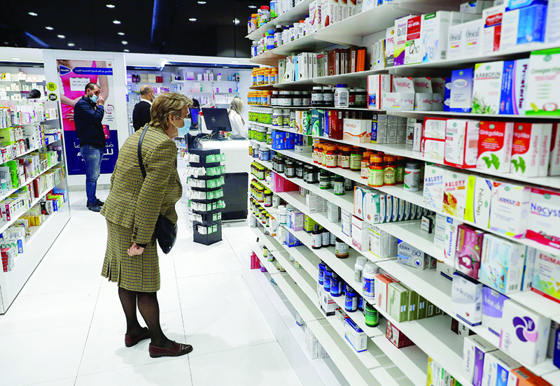 BEIRUT: Customers browse the aisles for medicine at a pharmacy in the Lebanese capital Beirut on Feb 2, 2021. - AFP n