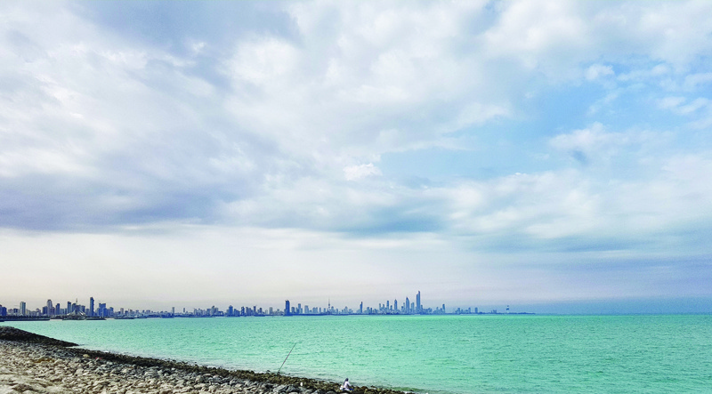 KUWAIT: An archive photo showing clouds over Kuwait City. - KUNAn