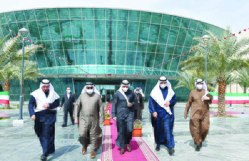 KUWAIT: Officials walk outside the Directorate General of Civil Aviation's (DGCA) new building yesterday. - Photo by Fouad Al-Shaikhn